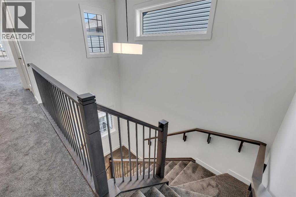 211 Creekstone Row Sw, Calgary, Alberta  T2X 4Y4 - Photo 21 - A2275428