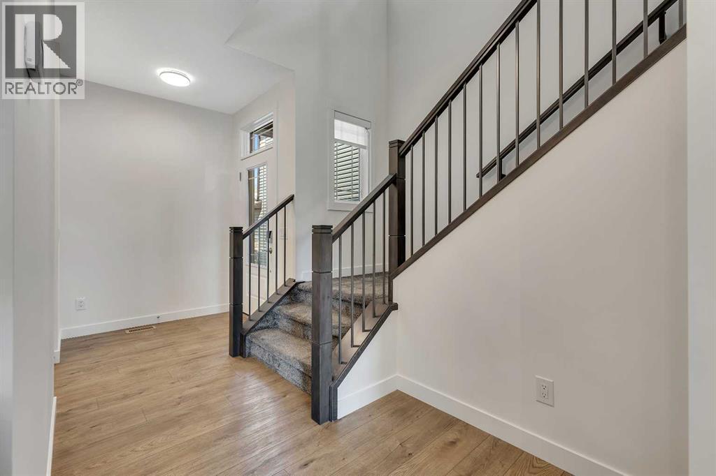 211 Creekstone Row Sw, Calgary, Alberta  T2X 4Y4 - Photo 20 - A2275428