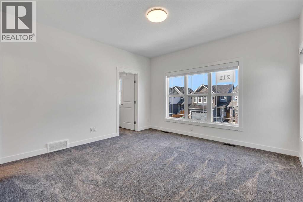 211 Creekstone Row Sw, Calgary, Alberta  T2X 4Y4 - Photo 26 - A2275428