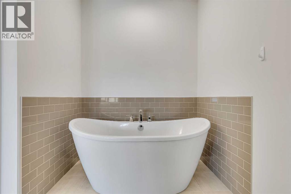 211 Creekstone Row Sw, Calgary, Alberta  T2X 4Y4 - Photo 30 - A2275428