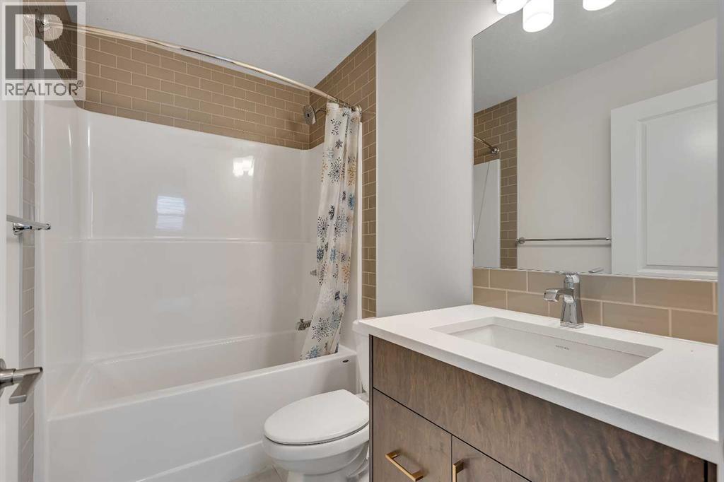 211 Creekstone Row Sw, Calgary, Alberta  T2X 4Y4 - Photo 33 - A2275428