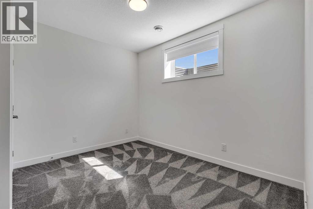 211 Creekstone Row Sw, Calgary, Alberta  T2X 4Y4 - Photo 41 - A2275428