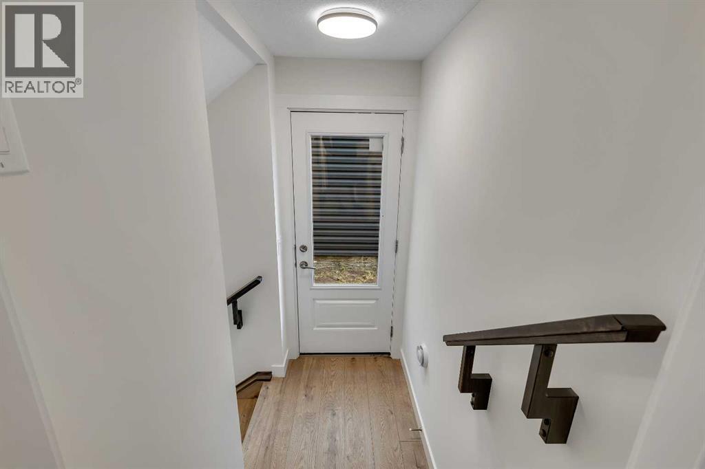 211 Creekstone Row Sw, Calgary, Alberta  T2X 4Y4 - Photo 36 - A2275428