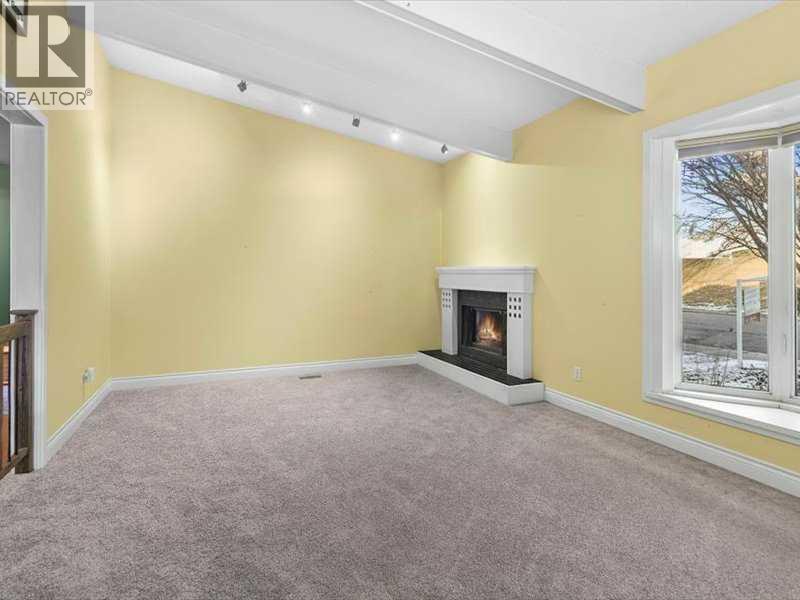 107 Woodford Crescent Sw, Calgary, Alberta  T2W 4C6 - Photo 7 - A2271657