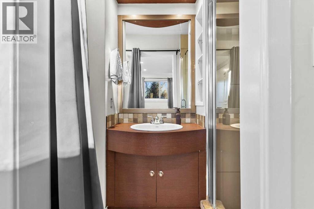 107 Woodford Crescent Sw, Calgary, Alberta  T2W 4C6 - Photo 21 - A2271657