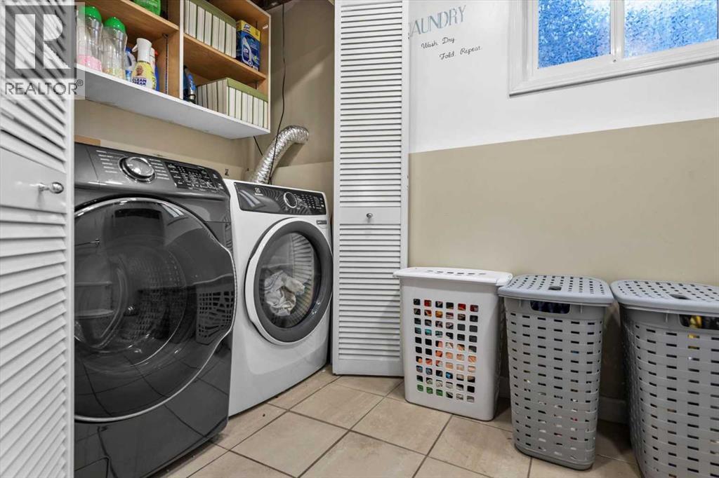 107 Woodford Crescent Sw, Calgary, Alberta  T2W 4C6 - Photo 34 - A2271657