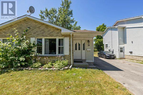 30 Woodstone Crescent, Kingston, Ontario K7M 6K9 - Photo 4 - X12638070