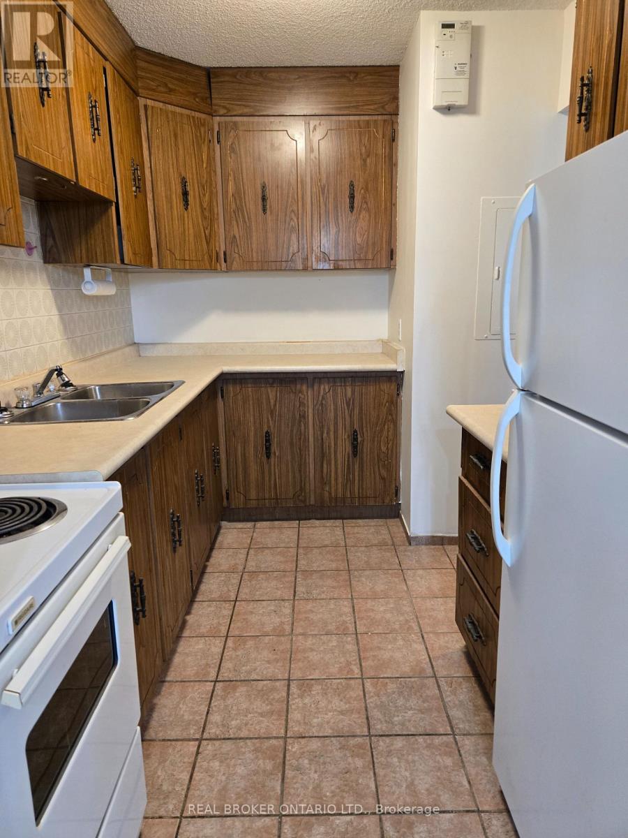 402 - 97 Nonquon Road, Oshawa, Ontario  L1G 3R8 - Photo 2 - E12638158