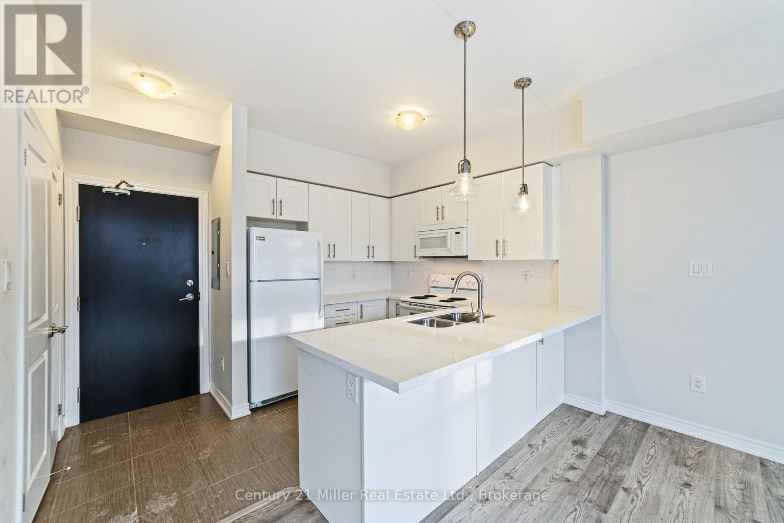 306 - 2326 Taunton Road, Oakville, Ontario  L6H 0L3 - Photo 4 - W12460010