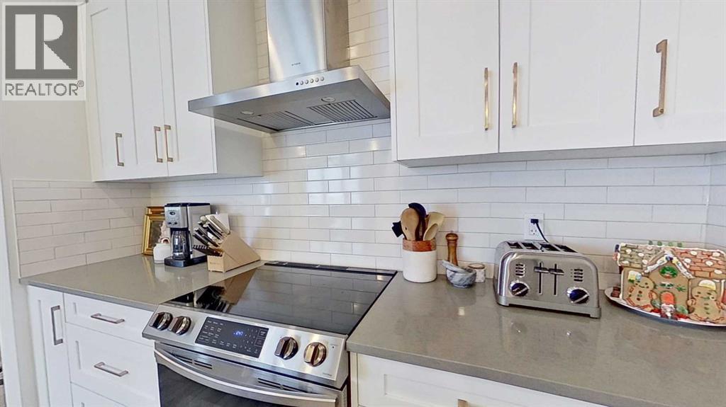 184 Emberside Place, Cochrane, Alberta  T4C 3B1 - Photo 6 - A2274583