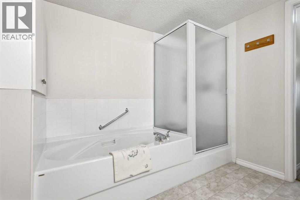 112, 6900 Hunterview Drive Nw, Calgary, Alberta  T2K 6K6 - Photo 17 - A2273856