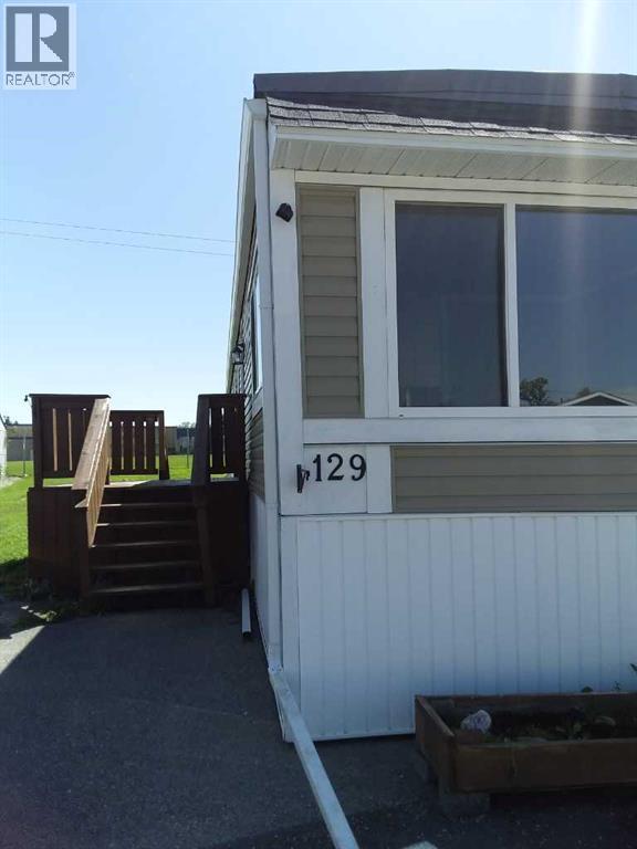 129 Sunset Way Ne, High River, Alberta  T1V 1J4 - Photo 1 - A2245548