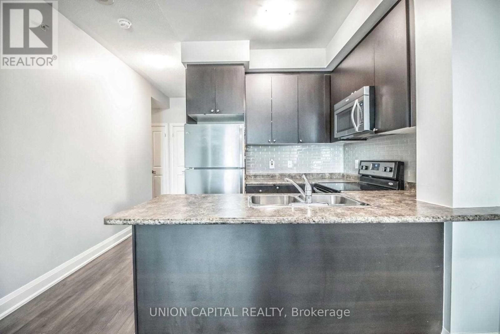 306 - 55 Yorkland Boulevard, Brampton (Goreway Drive Corridor), Ontario  L6P 4K9 - Photo 4 - W12639126