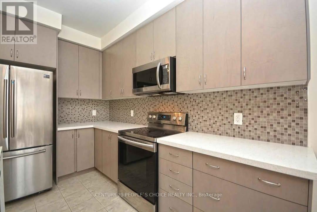 66 Holbrook Court, Milton, Ontario  L9E 1J1 - Photo 5 - W12639240