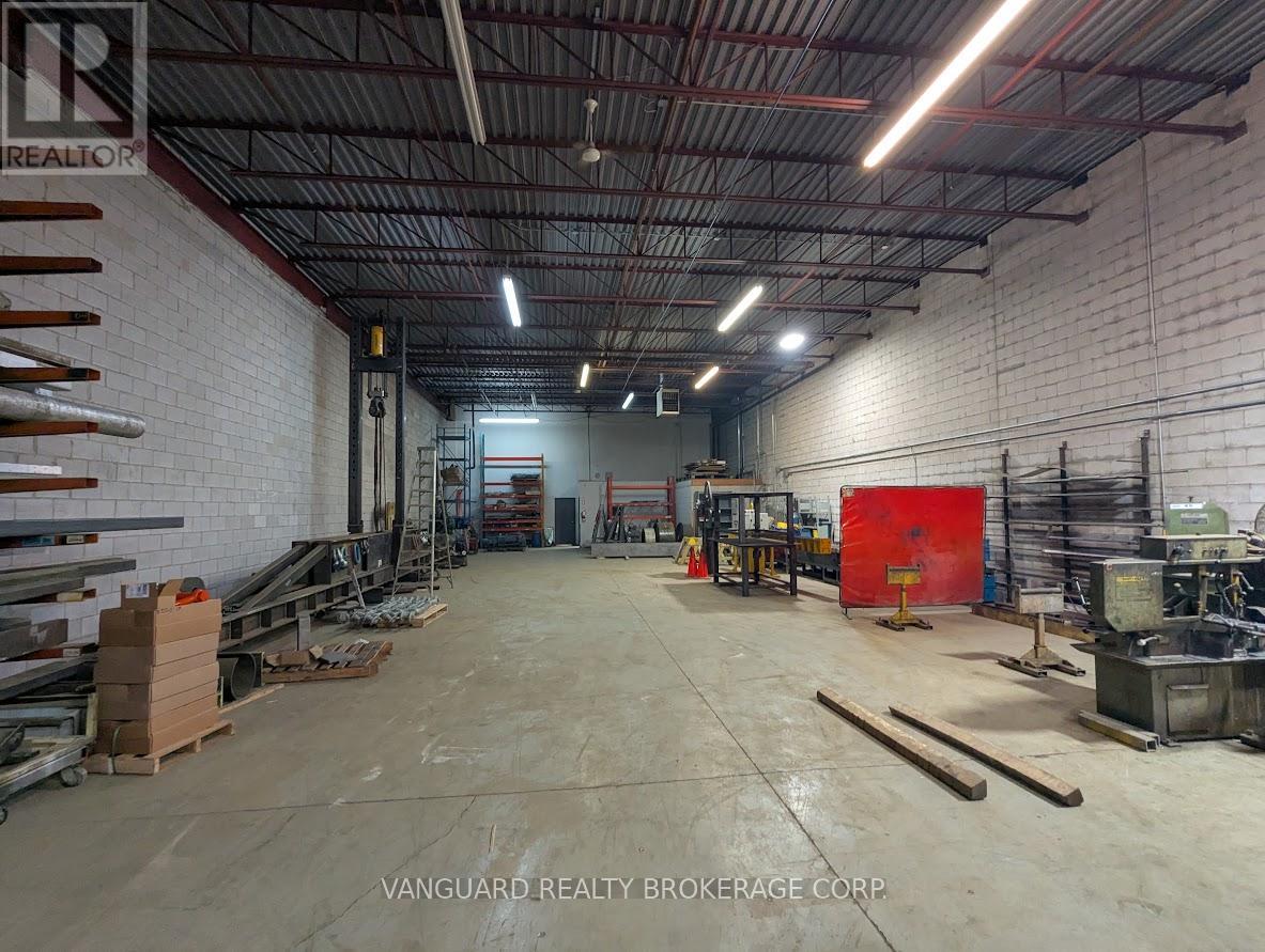 8 - 1750 Courtneypark Drive, Mississauga, Ontario  L5T 1W1 - Photo 9 - W12424884