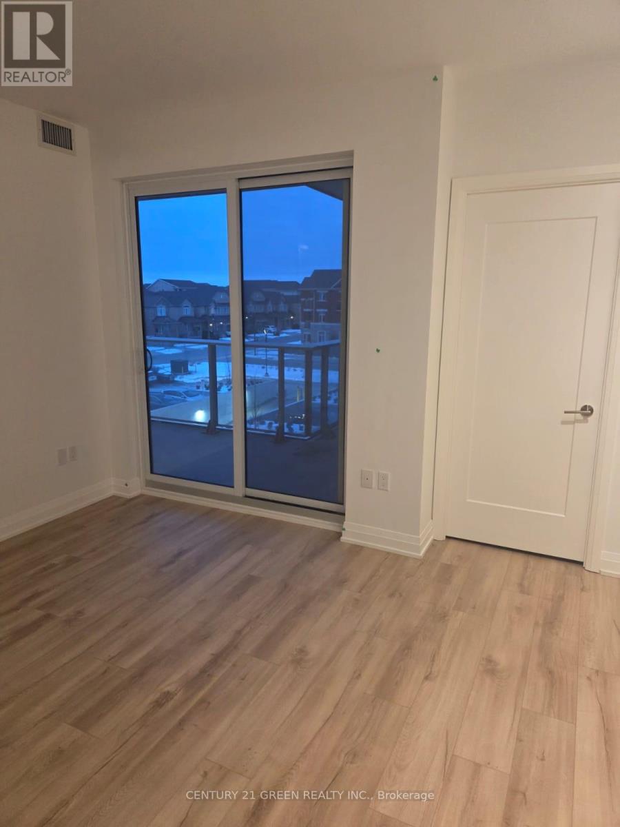 #325 - 412 Silver Maple Road, Oakville, Ontario  L6H 7X8 - Photo 4 - W12639272