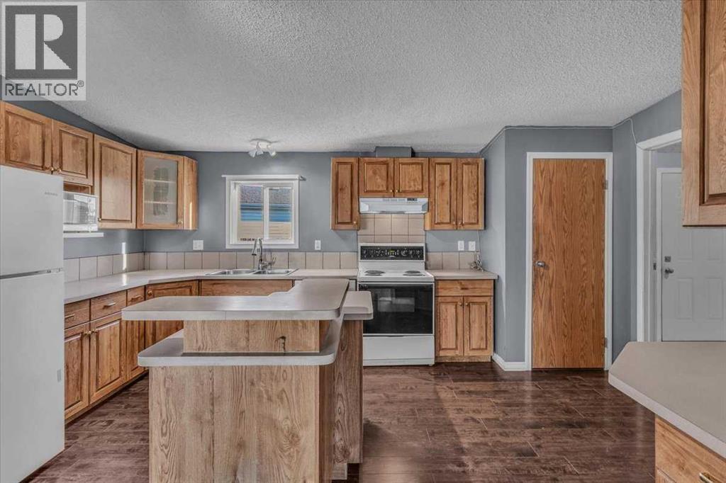 172 Meadowlark Lane, Carstairs, Alberta  T0M 0N0 - Photo 10 - A2263429