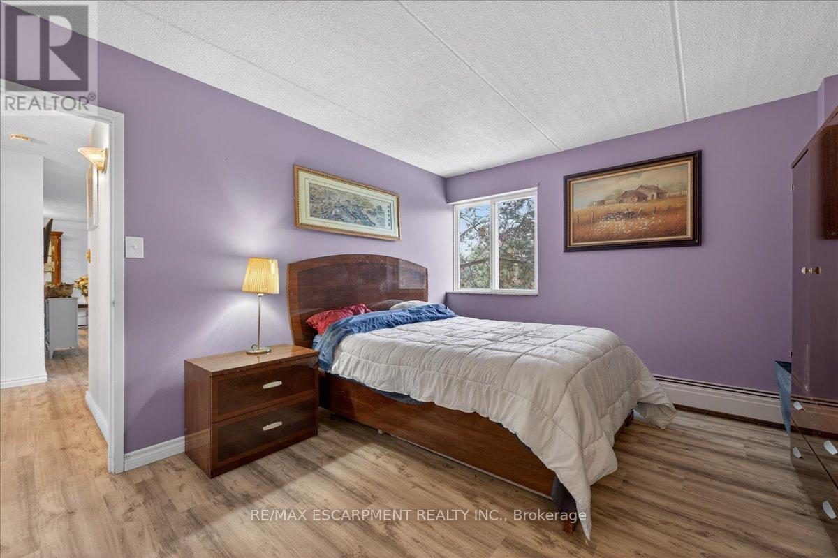 417 - 198 Scott Street, St. Catharines, Ontario L2N 5T3 - Photo 12 - X12639402