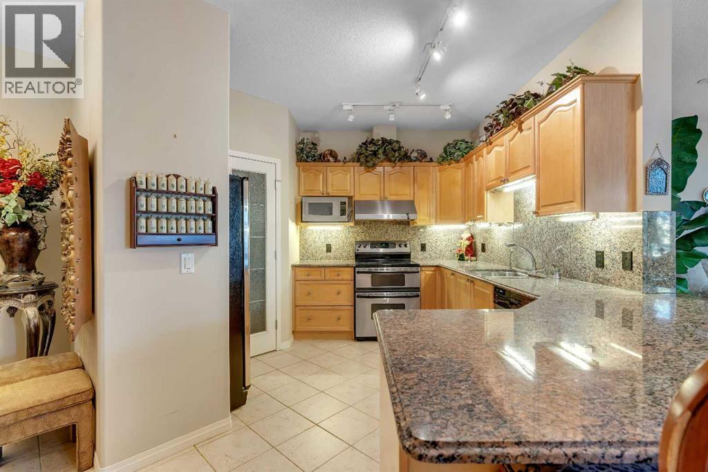 3206, 3206 Lake Fraser Court Se, Calgary, Alberta  T2J 7H4 - Photo 6 - A2275349