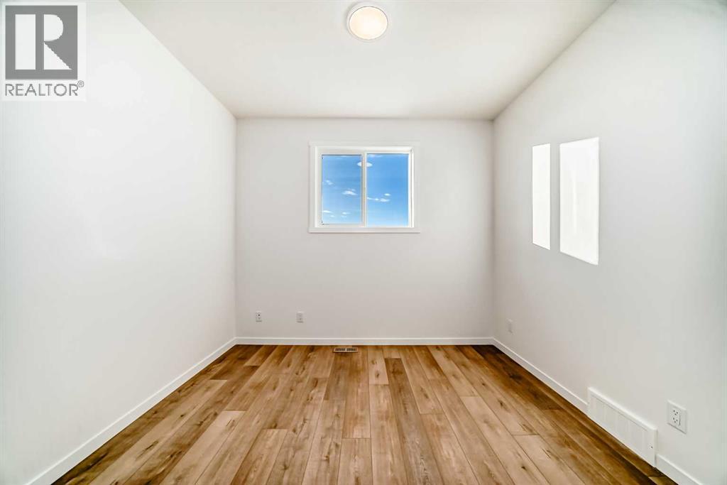 168 Southborough Common, Cochrane, Alberta T4C 3J5 - Photo 15 - A2273060