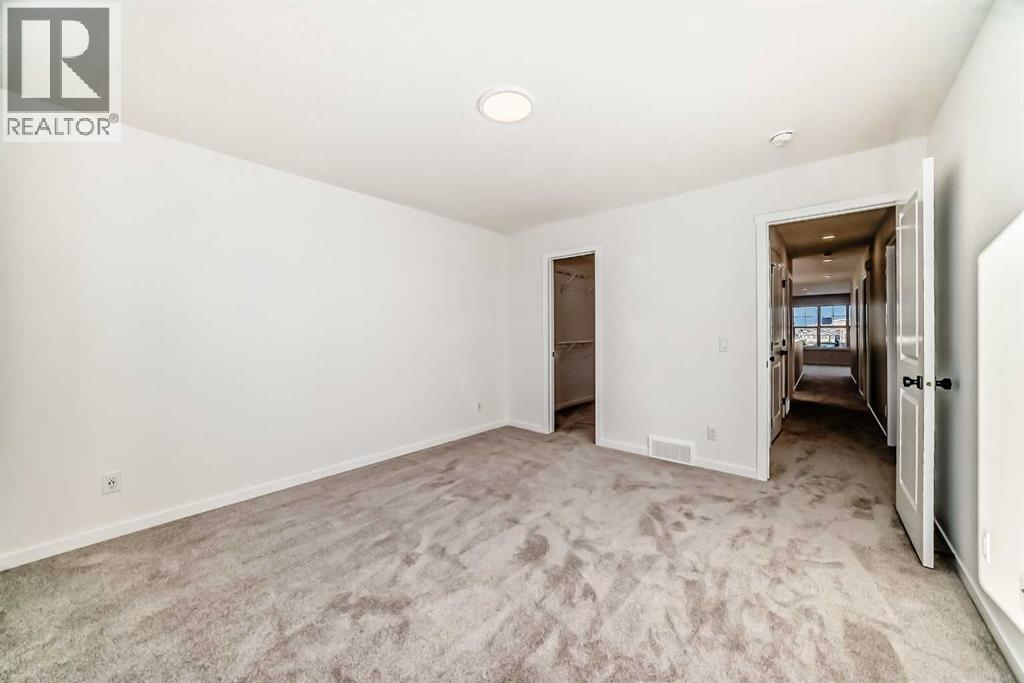 168 Southborough Common, Cochrane, Alberta T4C 3J5 - Photo 27 - A2273060