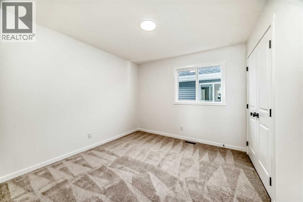 168 Southborough Common, Cochrane, Alberta T4C 3J5 - Photo 34 - A2273060