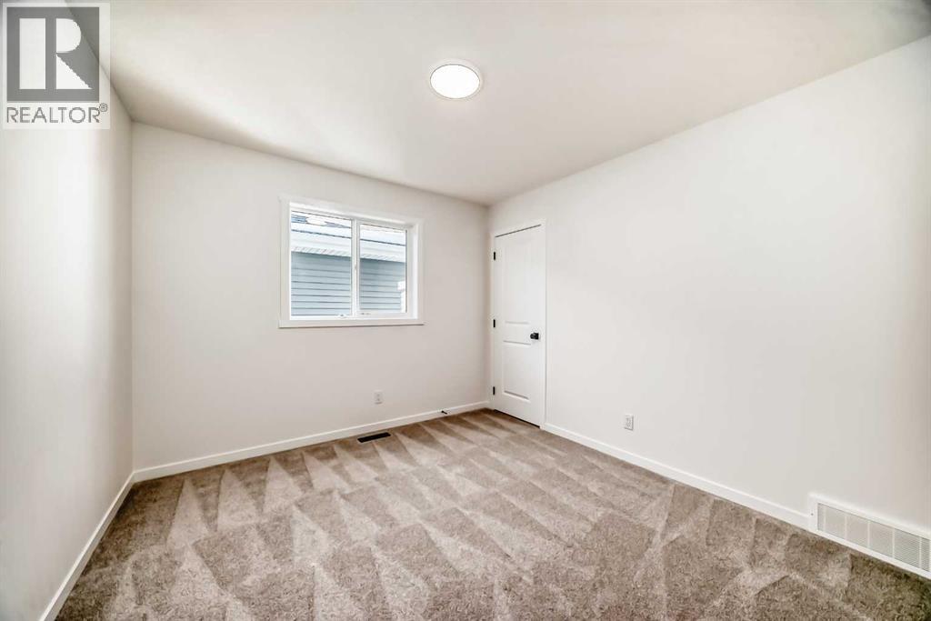 168 Southborough Common, Cochrane, Alberta T4C 3J5 - Photo 36 - A2273060