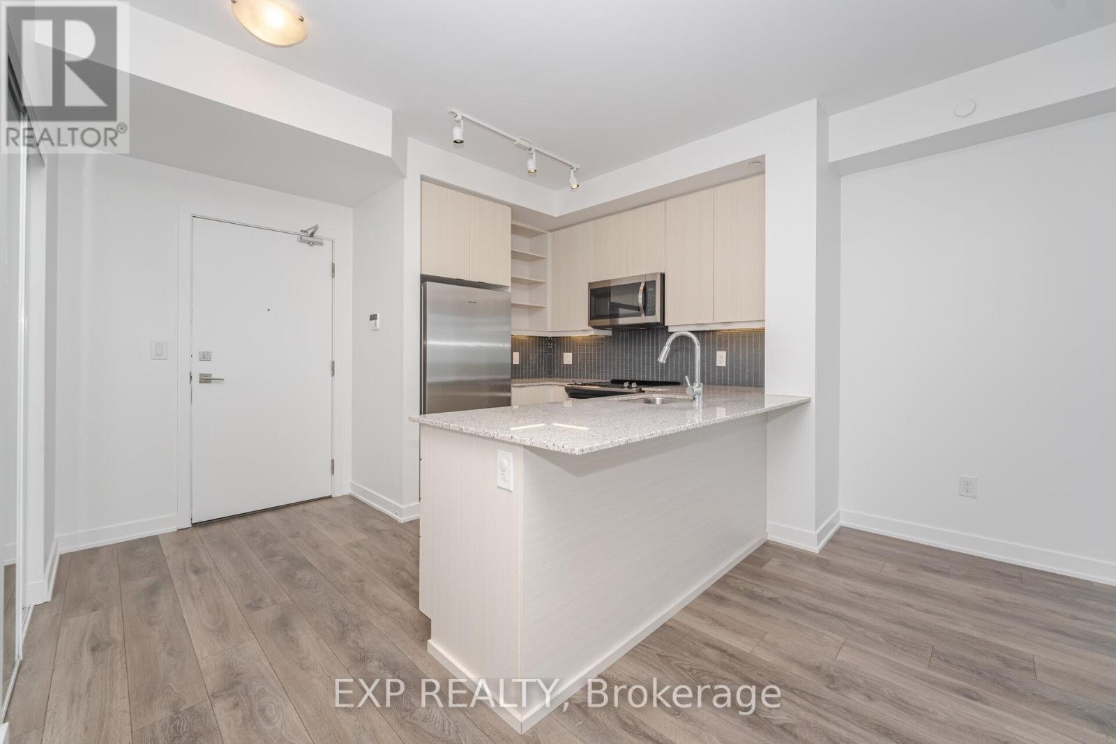 1205 - 4633 Glen Erin Drive, Mississauga, Ontario  L5M 7S1 - Photo 2 - W12637986