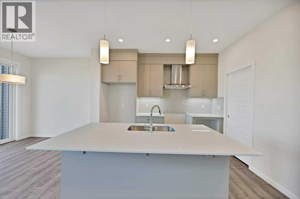 537 Chelsea Gardens, Chestermere, Alberta  T1X 2V5 - Photo 8 - A2268014