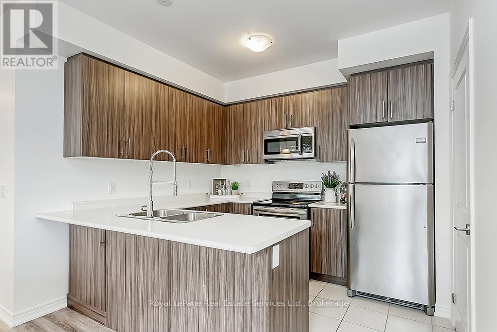 204 - 276 Gatwick Drive, Oakville, Ontario  L6H 0K8 - Photo 8 - W12639834