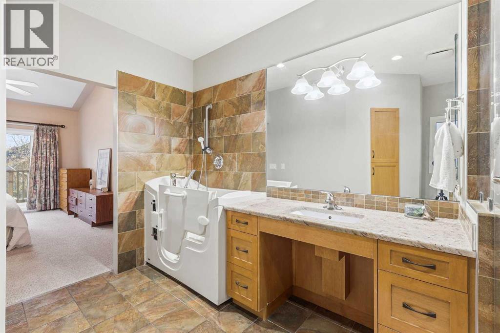 98 Mt Alberta Manor Se, Calgary, Alberta  T2Z 3J4 - Photo 28 - A2270128