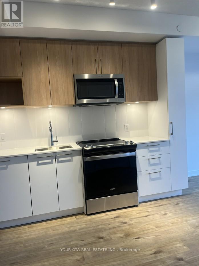 505 - 500 Plains Road E Road, Burlington, Ontario  L7T 2E1 - Photo 2 - W12639838