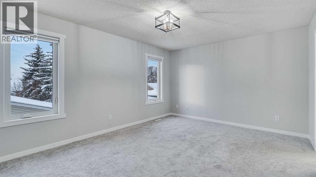 3667 Sierra Morena Road Sw, Calgary, Alberta  T3H 3A6 - Photo 19 - A2273484