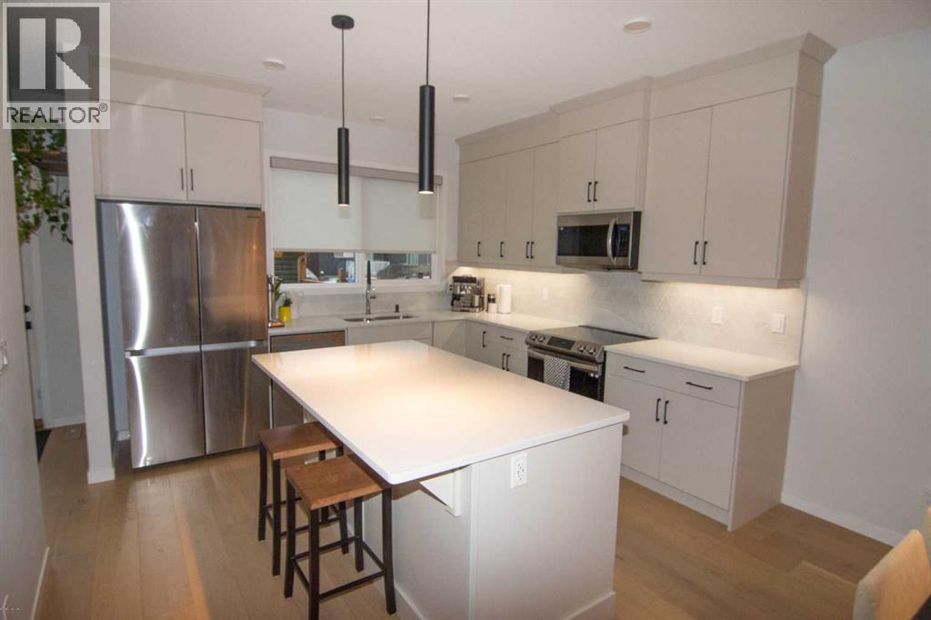 551 Wolf Creek Way Se, Calgary, Alberta  T2X 4Y9 - Photo 10 - A2275232