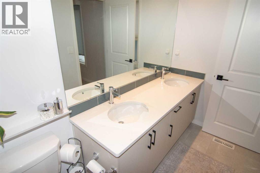 551 Wolf Creek Way Se, Calgary, Alberta  T2X 4Y9 - Photo 19 - A2275232