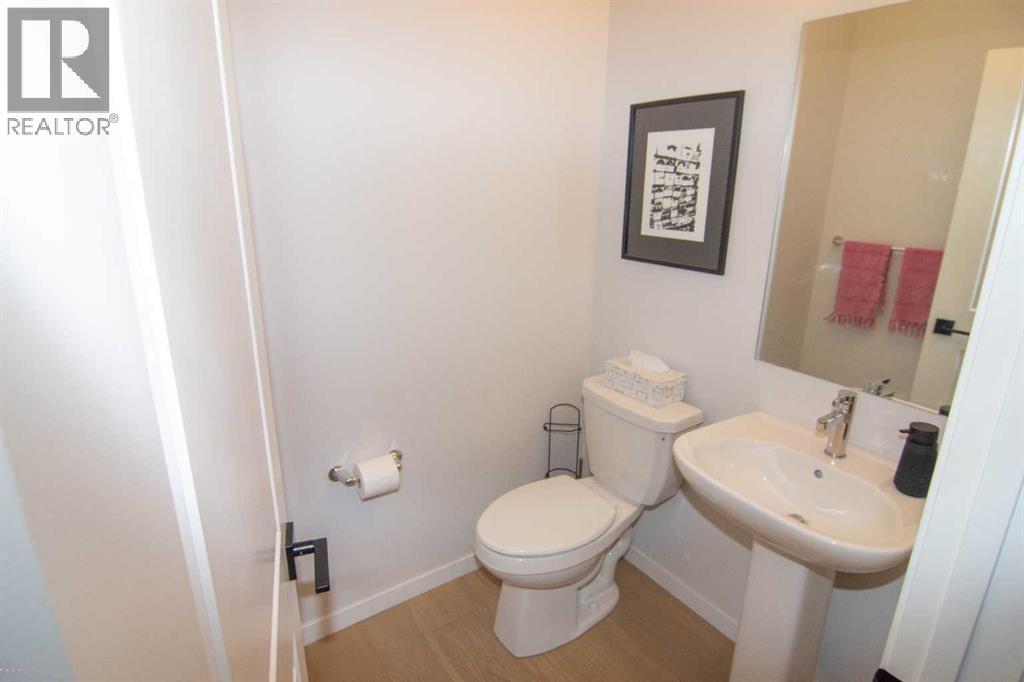 551 Wolf Creek Way Se, Calgary, Alberta  T2X 4Y9 - Photo 13 - A2275232