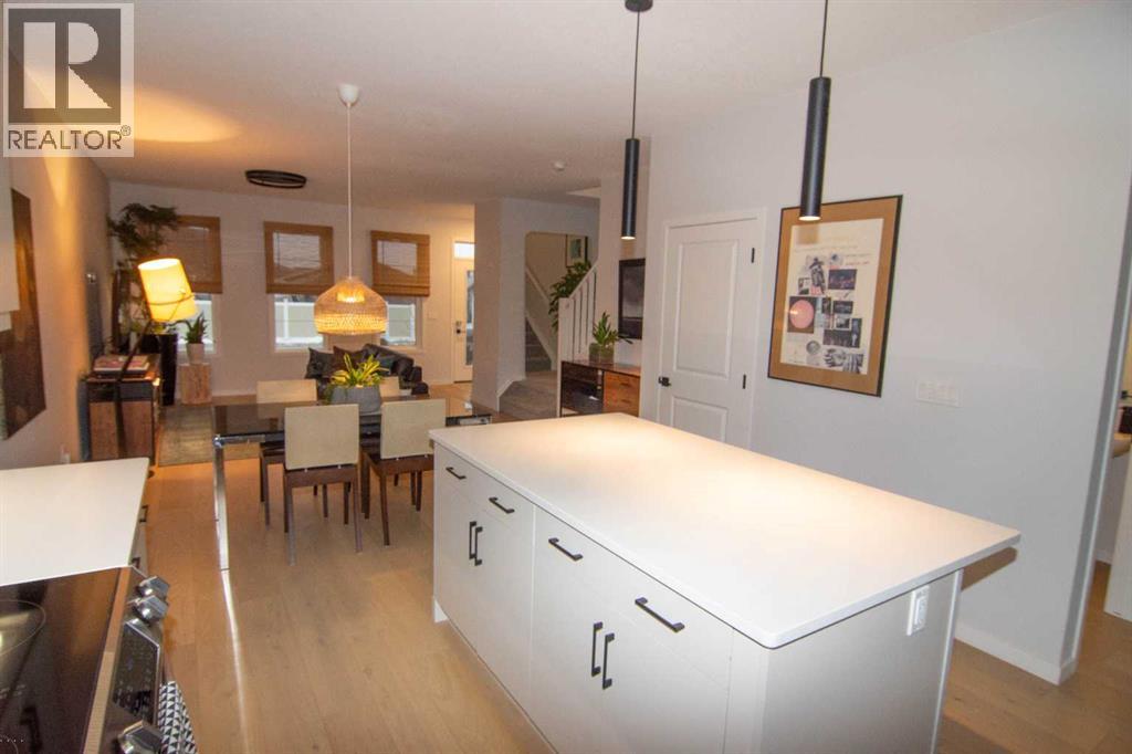 551 Wolf Creek Way Se, Calgary, Alberta  T2X 4Y9 - Photo 12 - A2275232