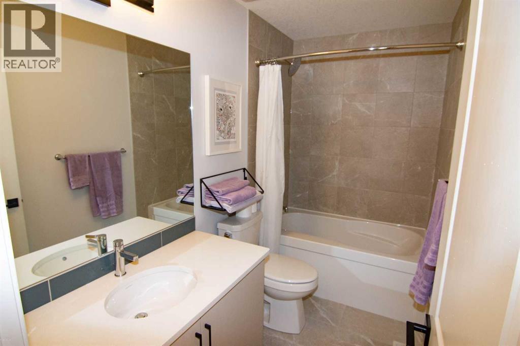 551 Wolf Creek Way Se, Calgary, Alberta  T2X 4Y9 - Photo 23 - A2275232