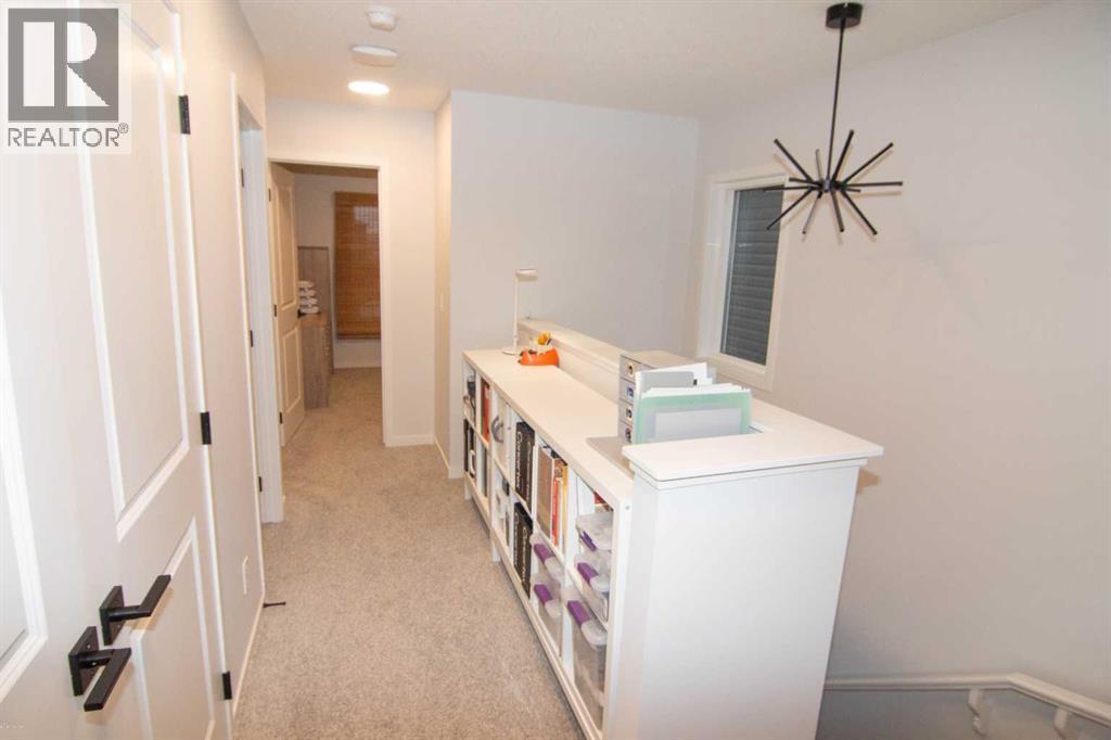 551 Wolf Creek Way Se, Calgary, Alberta  T2X 4Y9 - Photo 21 - A2275232