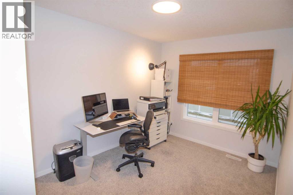 551 Wolf Creek Way Se, Calgary, Alberta  T2X 4Y9 - Photo 25 - A2275232