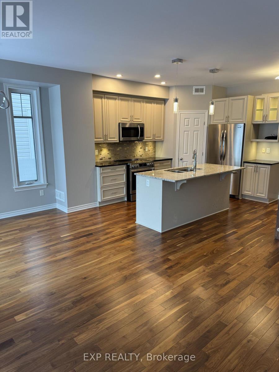 231 Brambling Way, Ottawa, Ontario  K2J 0E4 - Photo 4 - X12640344