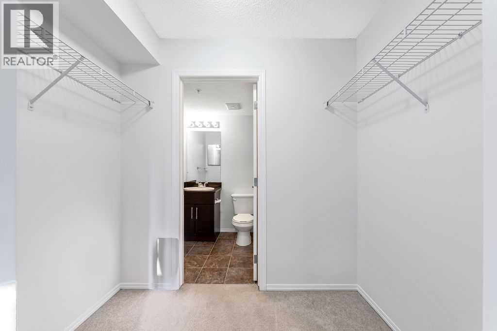 9113, 403 Mackenzie Way Sw, Airdrie, Alberta  T4B 3V7 - Photo 10 - A2273359