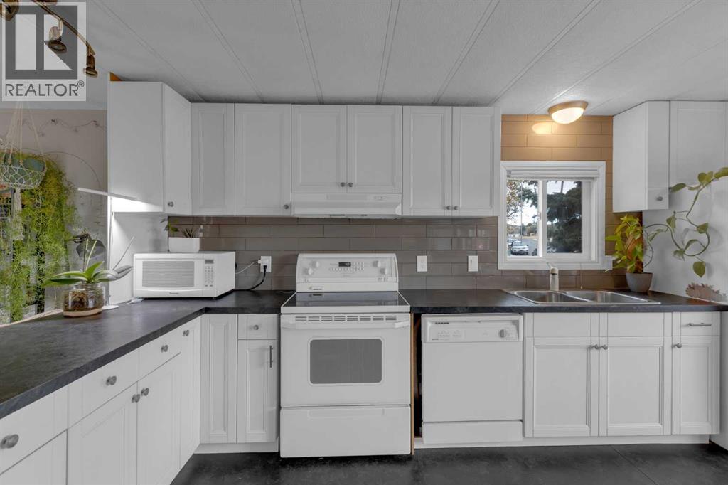 47 Huntstrom Drive Ne, Calgary, Alberta  T2K 5T4 - Photo 6 - A2264392