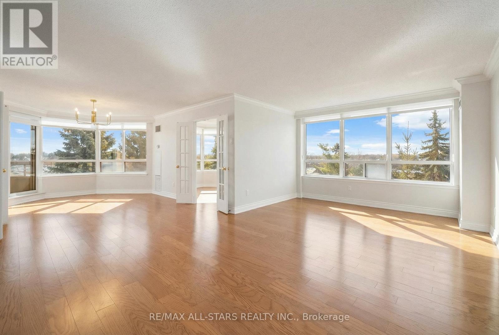 404 - 610 Bullock Drive, Markham, Ontario  L3R 0G1 - Photo 3 - N12641308