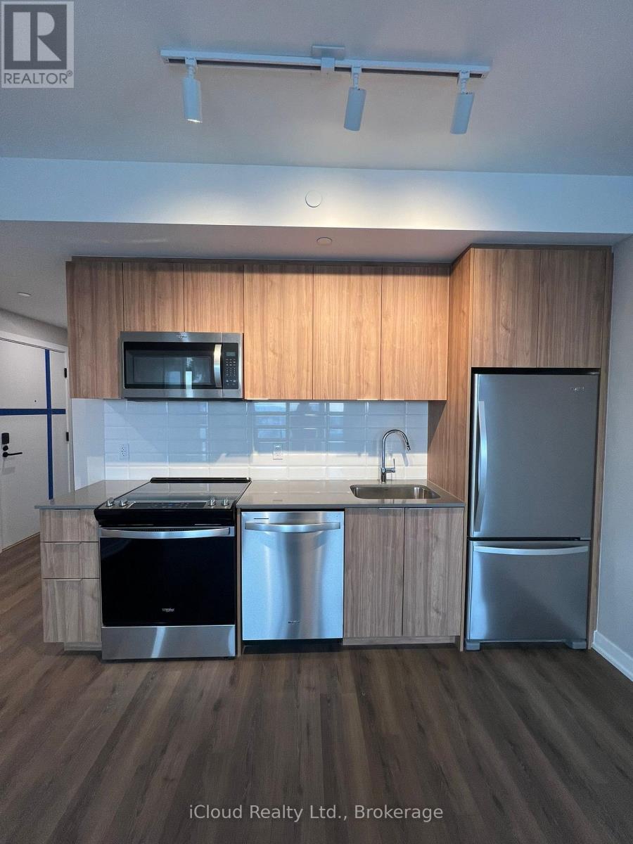 411 - 720 Whitlock Avenue, Milton, Ontario  L9E 2B5 - Photo 4 - W12641378