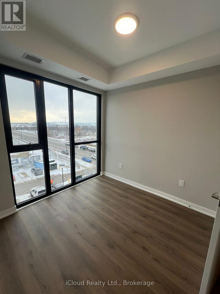 411 - 720 Whitlock Avenue, Milton, Ontario  L9E 2B5 - Photo 9 - W12641378