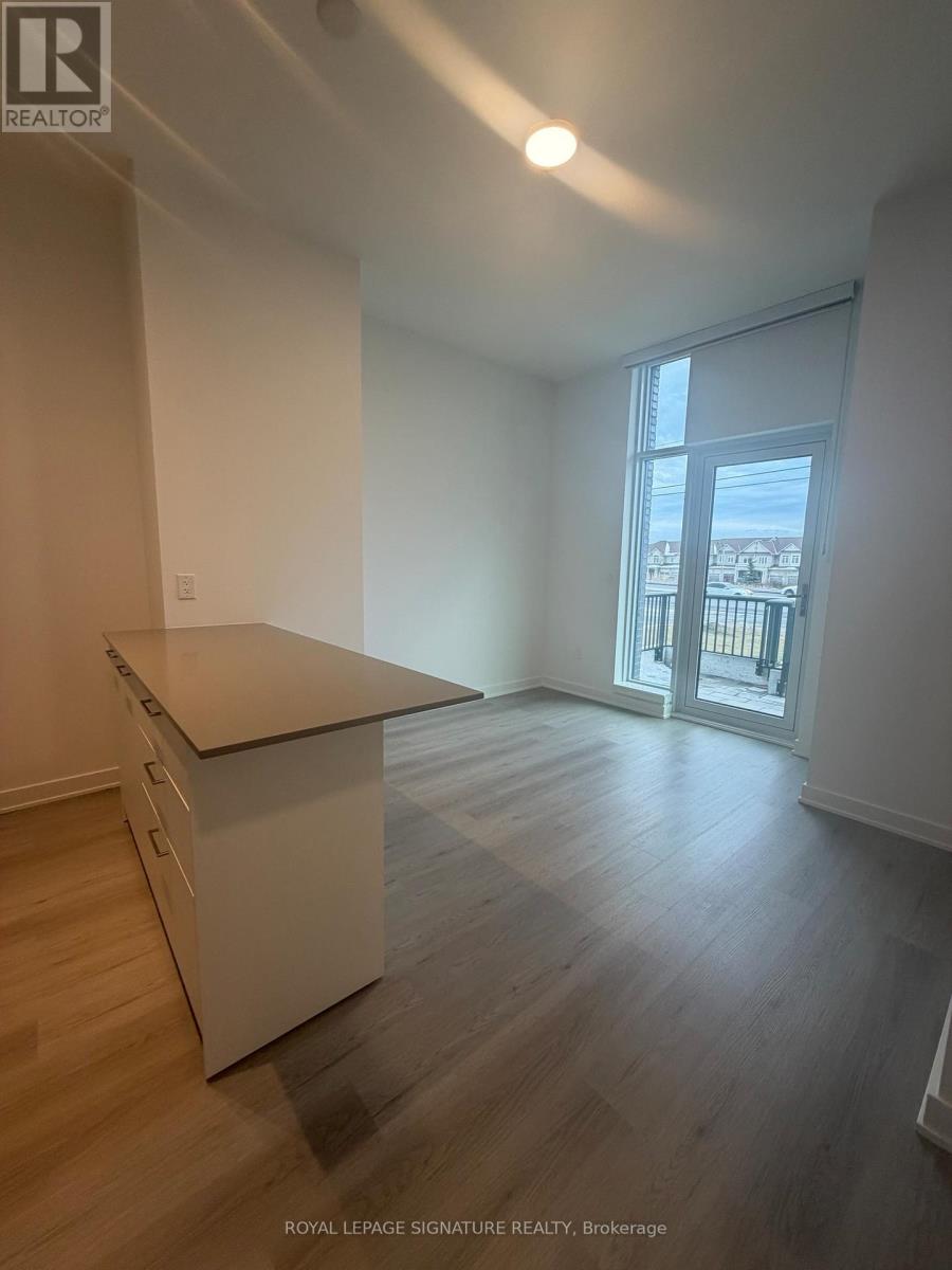 101 - 40 Lagerfeld Drive, Brampton, Ontario  L7A 5L5 - Photo 3 - W12639824