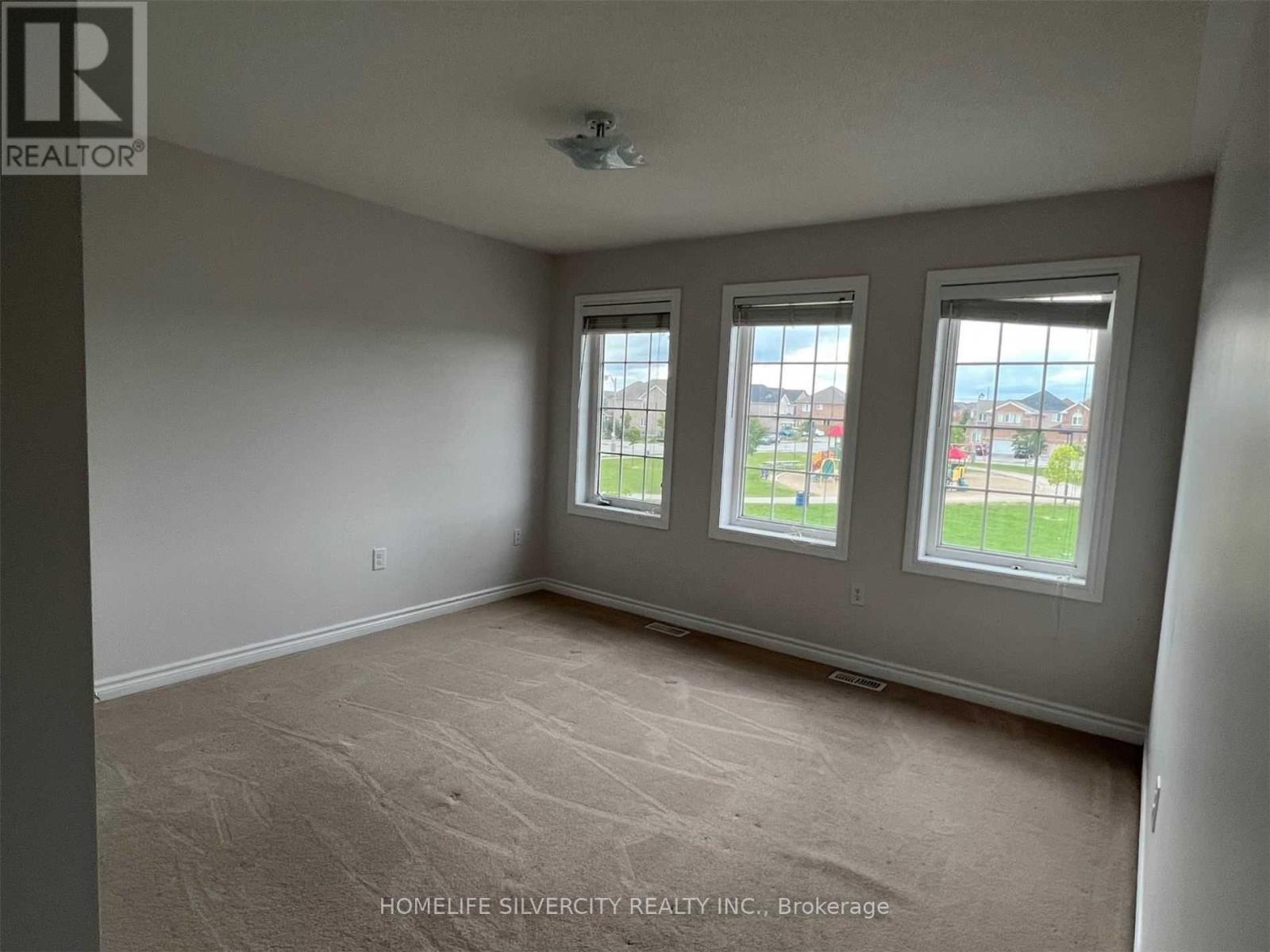 87 Summitgreen Crescent, Brampton, Ontario  L6R 0T6 - Photo 7 - W12641560