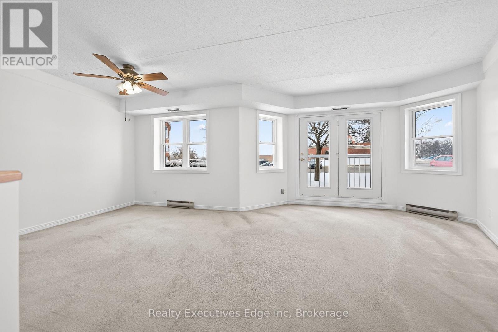 103 - 208 Silvercreek Parkway N, Guelph, Ontario  N1H 8H2 - Photo 2 - X12633604