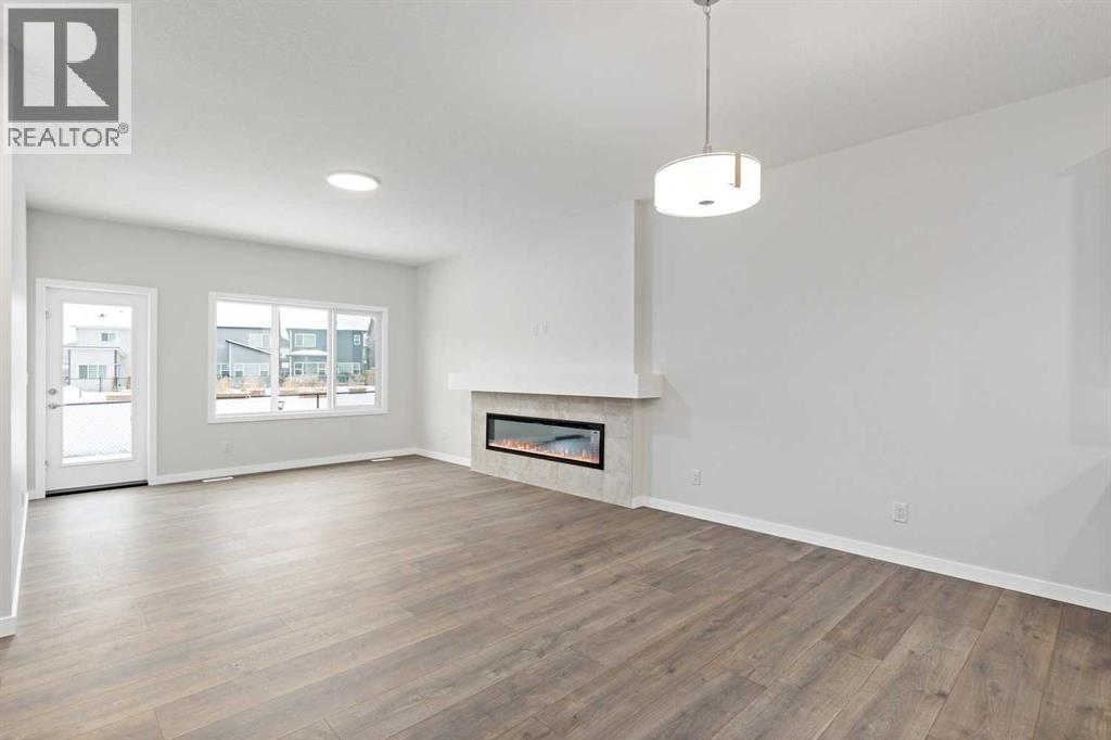 136 Wolf Hollow Manor Se, Calgary, Alberta  T2X 5R9 - Photo 2 - A2264875